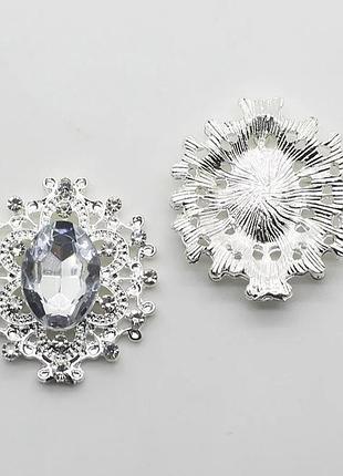 Камень в серебристой ажурной оправе 30*32 мм серебро