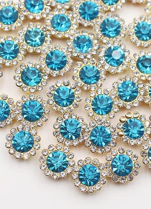 Страз пришивной 12 мм гудзичок блакитний в золотій оправі