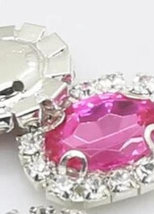 Камень в серебристой оправе 2*1,5 см ярко-розовый