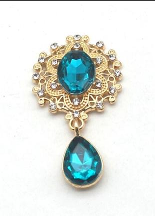 Камень с подвеской в ажурной золотистой оправе темная бирюза 2,6*4,6 см