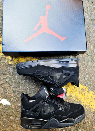 Нові nike air jordan 4 black cat4 фото