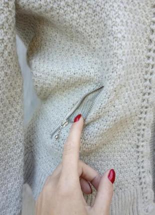 Интересный вязаный  шерстяной пуловер на молнии с вышевкой .5 фото