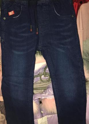 Нові утеплені джинси на резинці для хлопчика1 фото