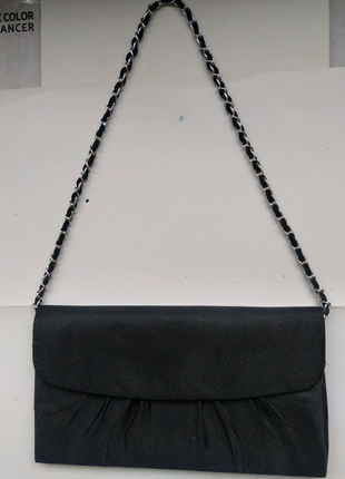 Стильна жіноча сумочка — гаманець на ланцюжку.1 фото