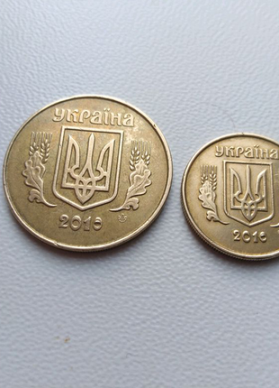 Монети 25 і 10 копійок 2010 шлюб (очей)