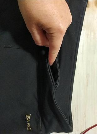 Эластичные спортивные штаныс кармашком в поясе7 фото