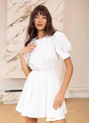 Мила сукня з пуговичками намистинками