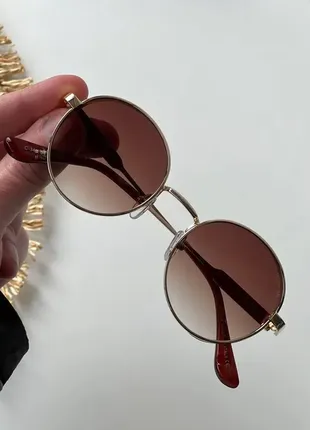 Женские круглые солнцезащитные очки в металлической оправе в цветах4 фото