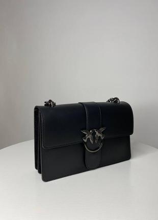 Чорна шкіряна жіноча сумка середнього розміру ремінець цепочка