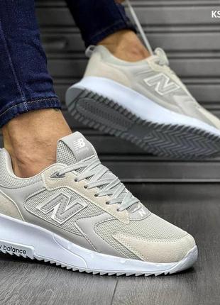 Кросівки new balance світло-сірі1 фото