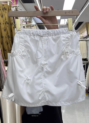 Короткая юбка мини с бантиками1 фото