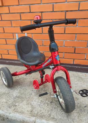 Триколісний велосипед червоний
