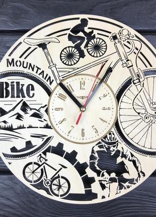 Круглі годинник з дерева на стіну «велосипед»1 фото