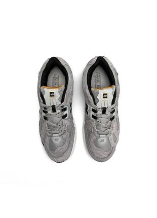Чоловічі кросівки new balance сірі з золотим 1906d protection gray black gold3 фото