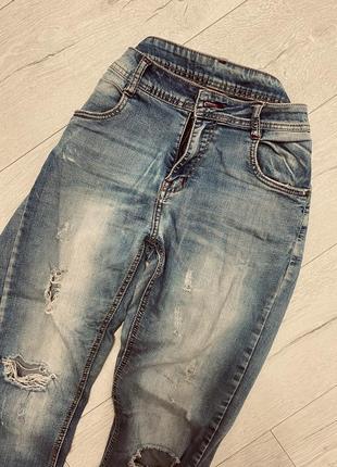 Жіночі джинси із рваностями2 фото