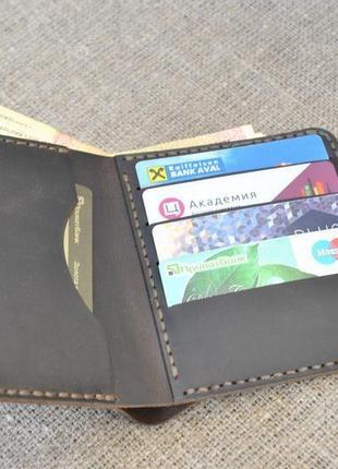 Шкіряний гаманець з незвичайним хлястиком k89-450