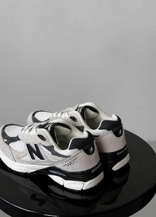 Женские кроссовки серые с черным new balance 990v3 x teddy santis moonbeam8 фото