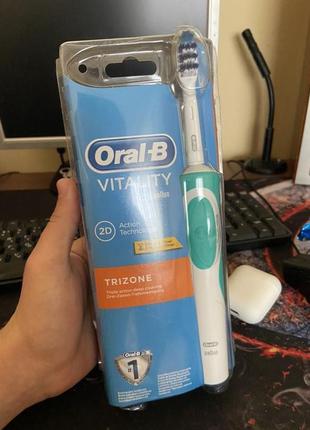 Oral-b електрична зубна щітка