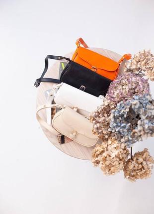 Унікальні жіночі сумочки: втілення стилю та функціональності!6 фото