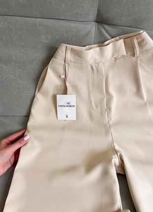 Новые бежевые брюки палаццо с высокой посадкой5 фото