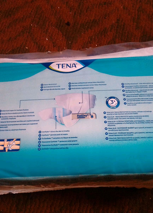 Памперси tena slip plus розмір s2 фото