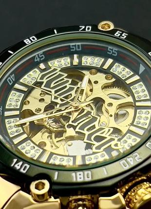 Мужские механические наручные часы скелетоны forsining 8186 gold-black с автоподзаводом.4 фото
