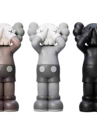Коллекционные фигурки kaws holiday uk