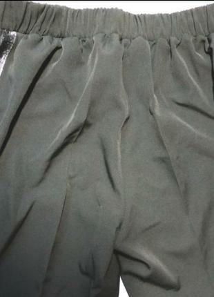 Черные укороченные зауженные брюки8 фото