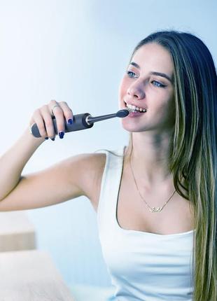 Електрична зубна щітка phniti sonic toothbrush + 8 насадок, кейс10 фото