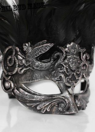 Карнавальна маска з пір'ям перс