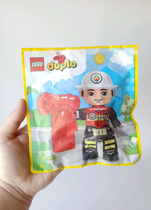 Фігурка лего дупло "пожежник". lego duplo.