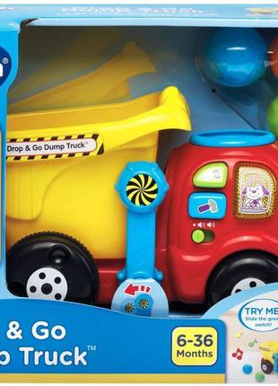 Музична машинка-каталка vtech drop and go dump truck6 фото