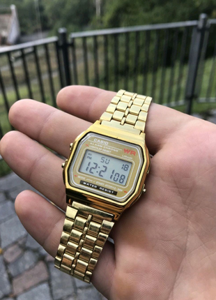 Нові годинники casio золоті1 фото