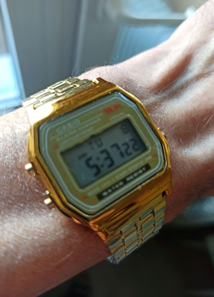 Нові годинники casio золоті2 фото