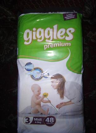 Підгузники premium giggles3 фото