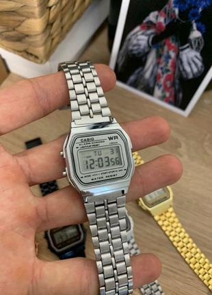 Наручний годинник casio a159w срібні з білим циферблатом