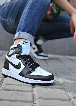 Nike air jordan 1 retro чорні з білим шкіра1 фото