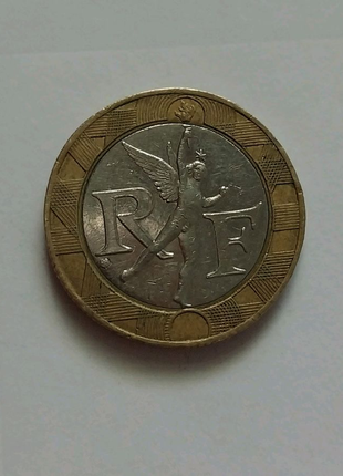 Монета 10 франків2 фото