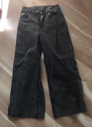 Сірі джинси кльош ,талія 66-68см,довжина 90 см,бедра 88-90