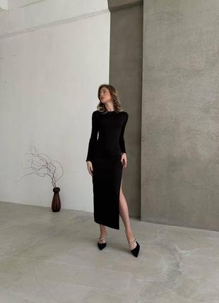 Облягаюча сукня міді, з розрізом на стегні, чорна6 фото