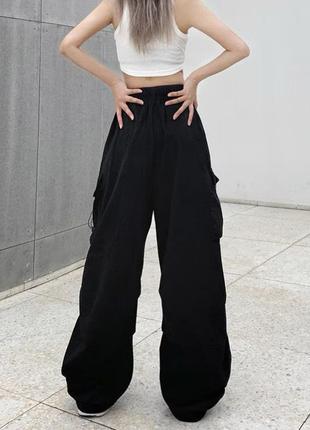 Легкие женские брюки карго свободного кроя.6 фото