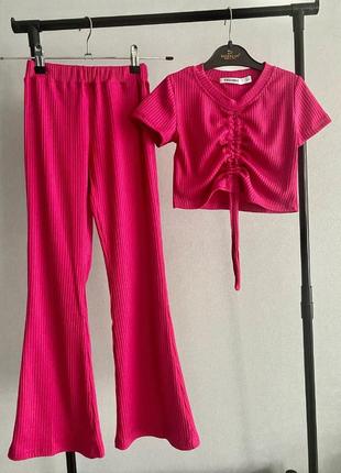 Костюм: брюки клеш + кроп топ на затяжке