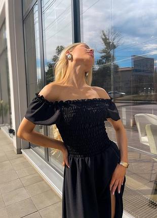 Чорна міді сукня з розрізом на ніжці на резинці креп жатка 42 44 46 48 50 52 вечірнє чорне максі плаття xs s m l xl xxl3 фото