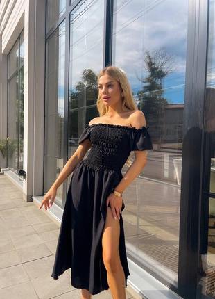 Чорна міді сукня з розрізом на ніжці на резинці креп жатка 42 44 46 48 50 52 вечірнє чорне максі плаття xs s m l xl xxl7 фото