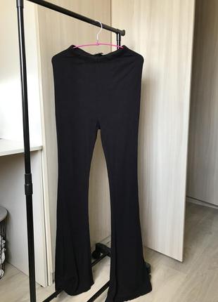 Штани кльош в рубчик