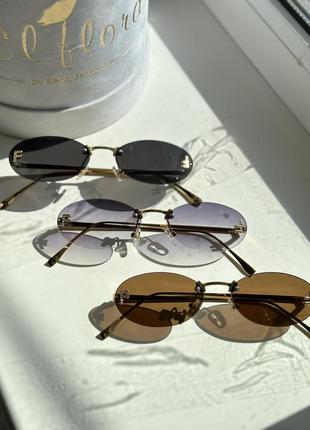 Окуляри жіночі сонцезахисні очки в стилі fendi чорна лінза золота оправа7 фото