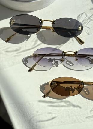 Окуляри жіночі сонцезахисні очки в стилі fendi чорна лінза золота оправа10 фото