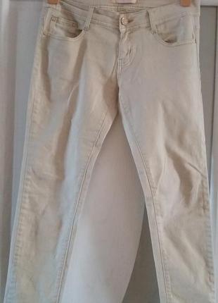 Світло-бежеві коттонові джинси.