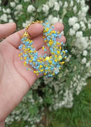 Желто-голубой браслет из бисера, красивый браслет в украинском стиле2 фото