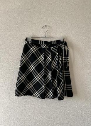Чорна тенісна міні-спідниця в клітинку yessica